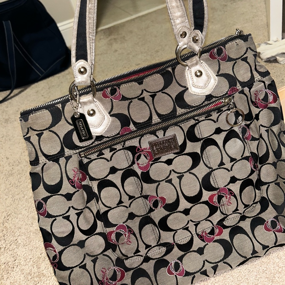 Black and silver Coach purse